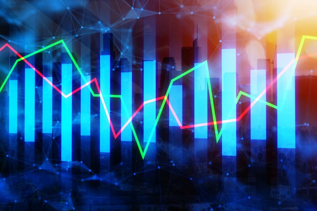 Abstract digital business chart on city background. Investment, finance, forex and trade concept. Double exposure